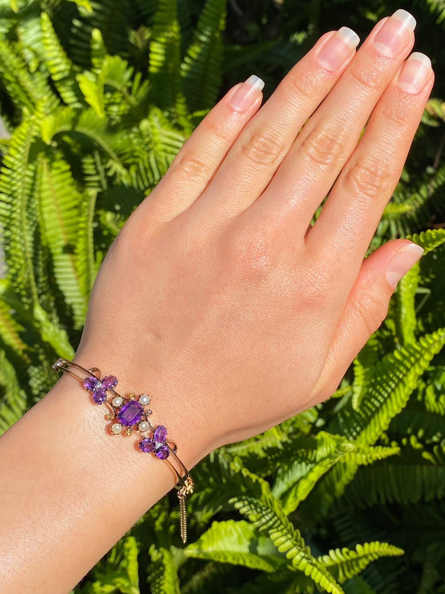 14K gold Edwardian amethyst, pearl, and diamond bangle.