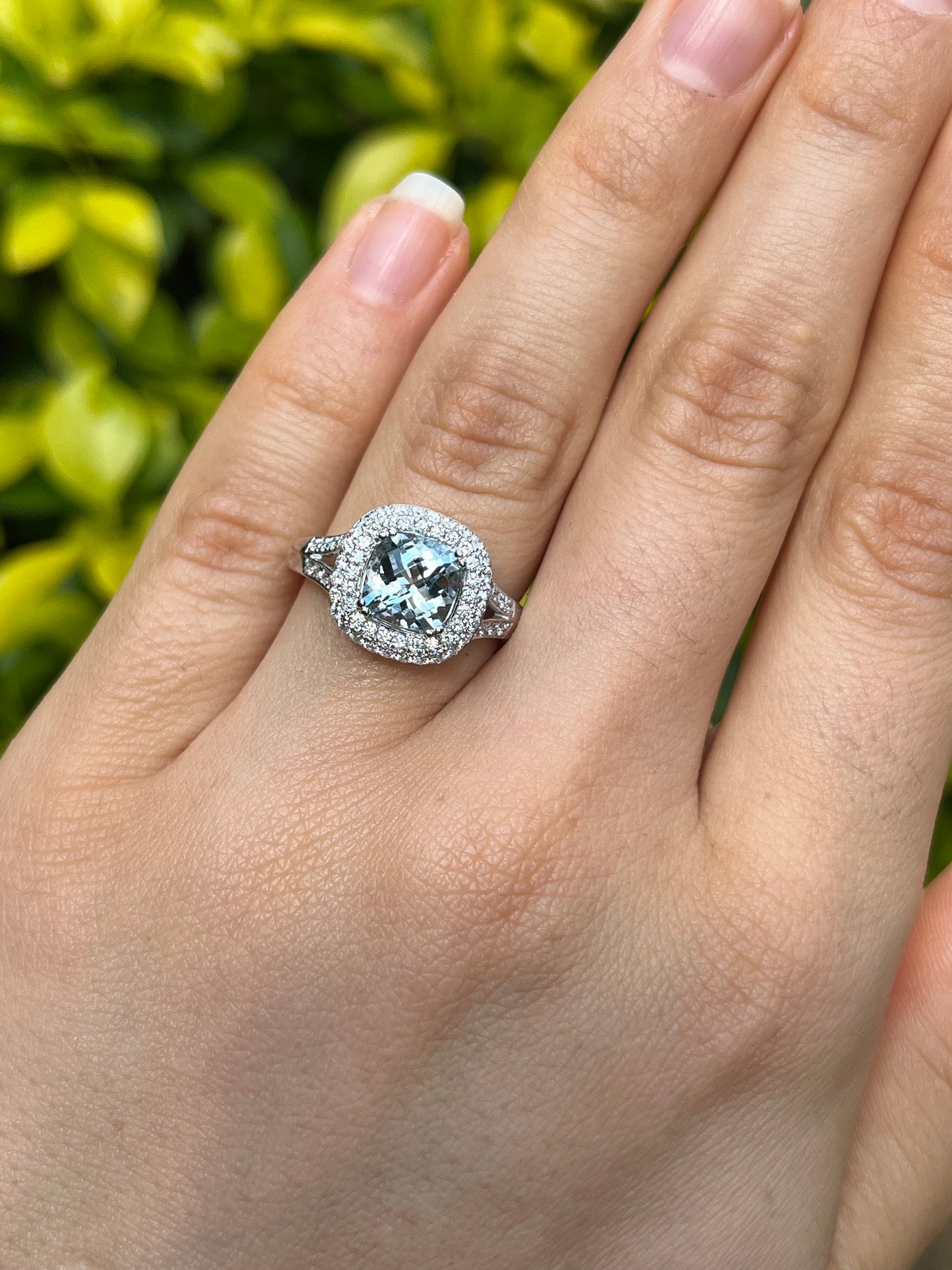 14K gold aquamarine and diamond double halo ring by Browns.