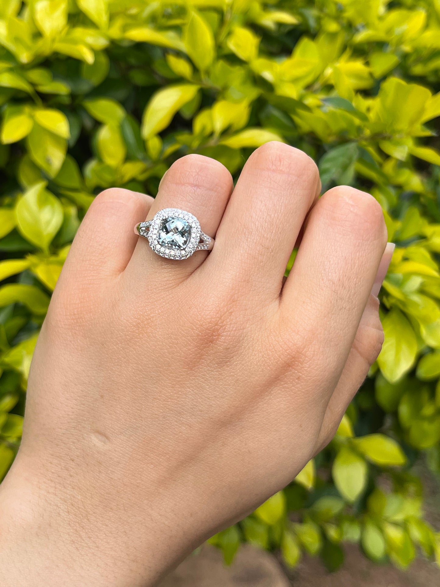 14K gold aquamarine and diamond double halo ring by Browns.