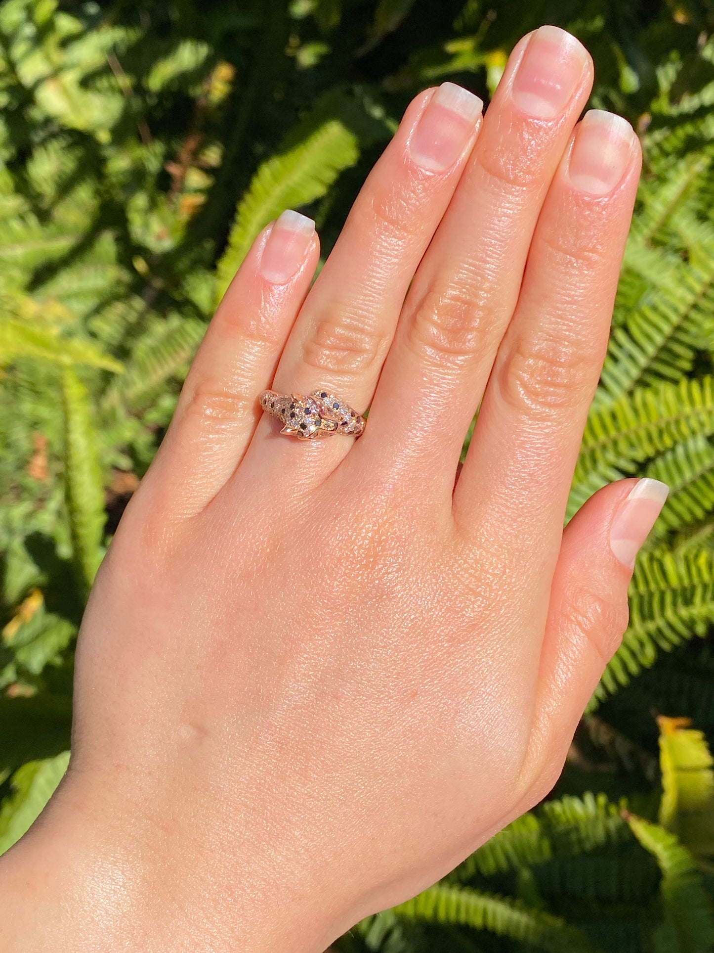 18K gold ruby and diamond leopard ring.