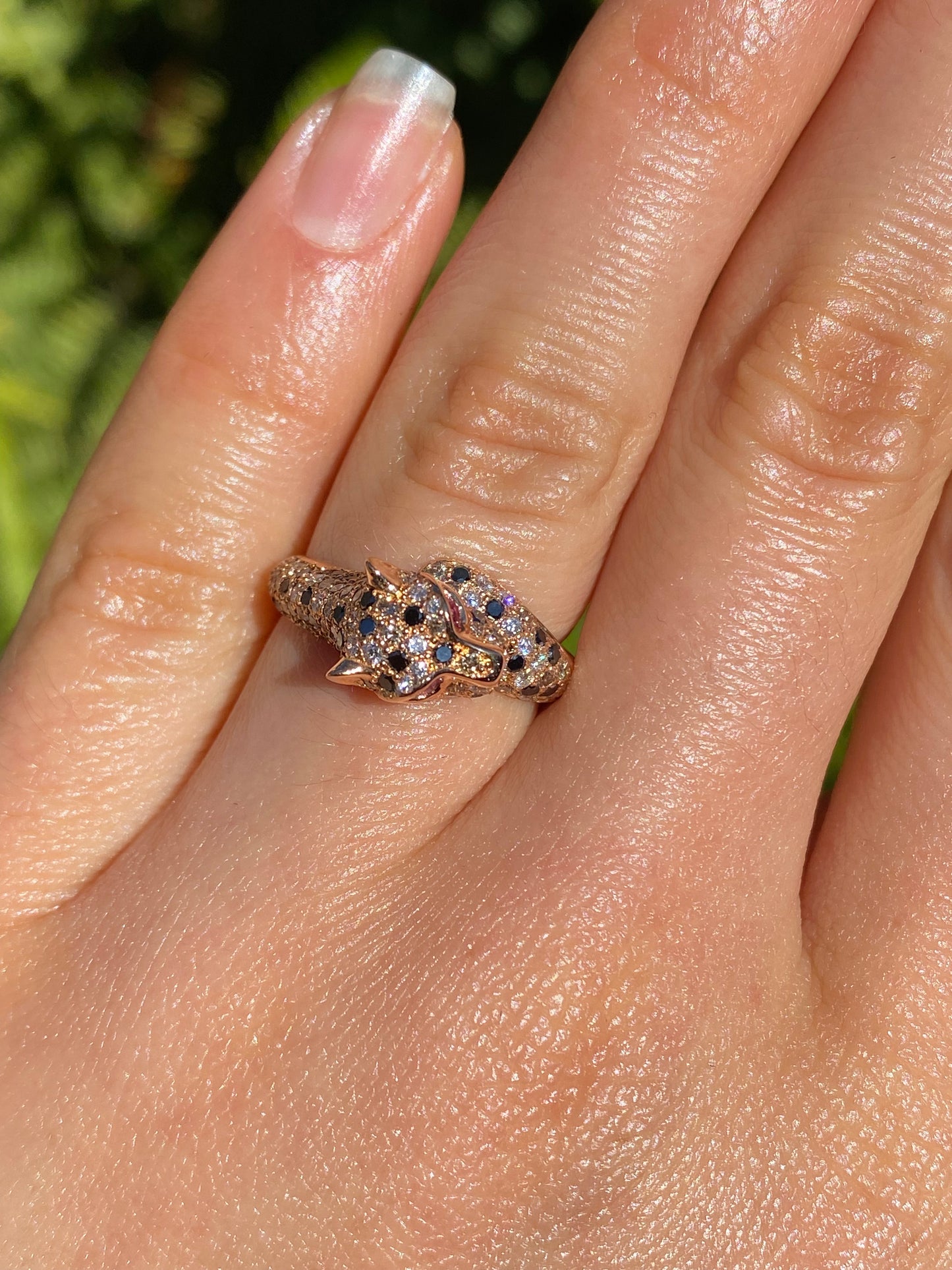 18K gold ruby and diamond leopard ring.