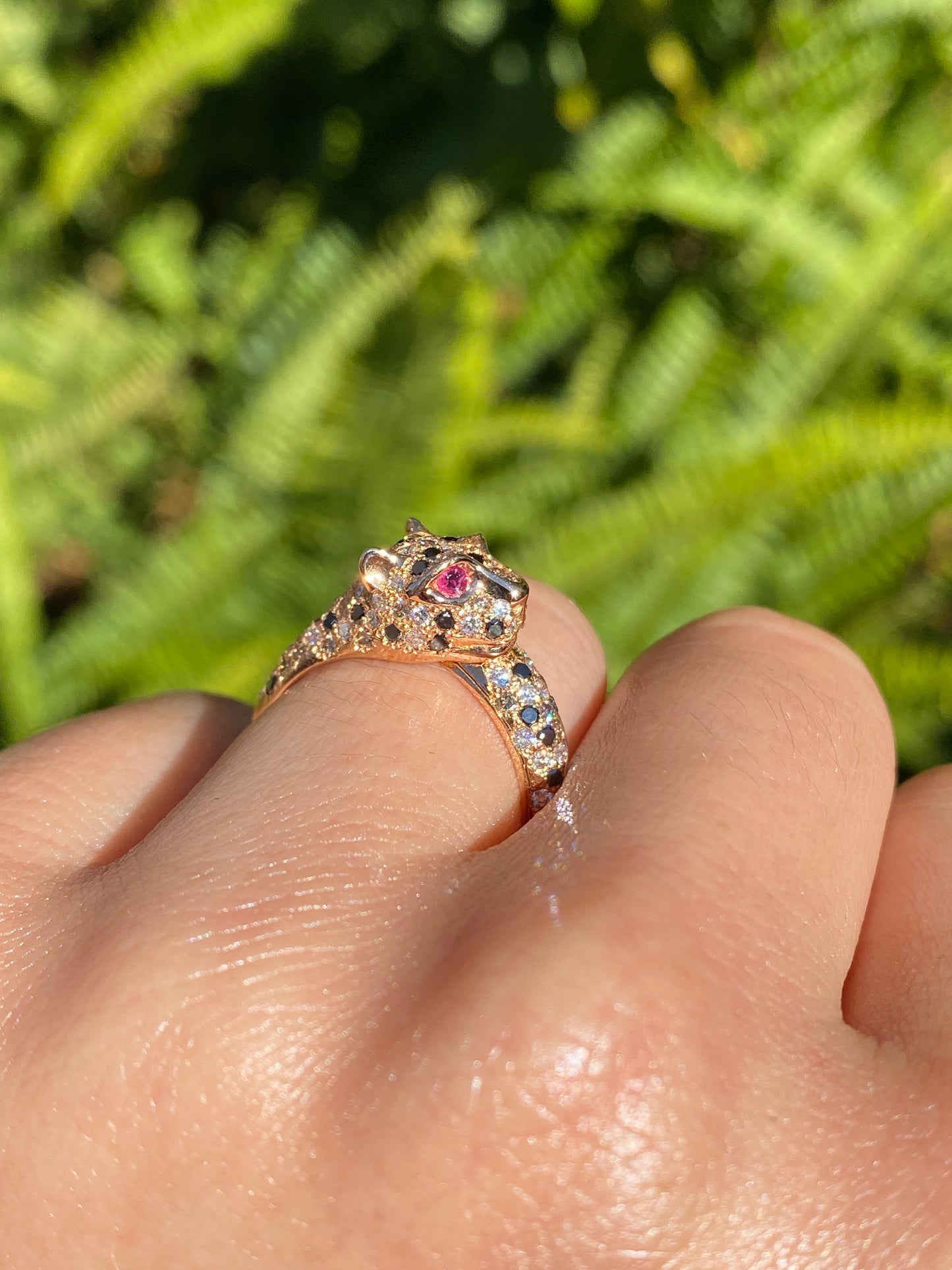 18K gold ruby and diamond leopard ring.