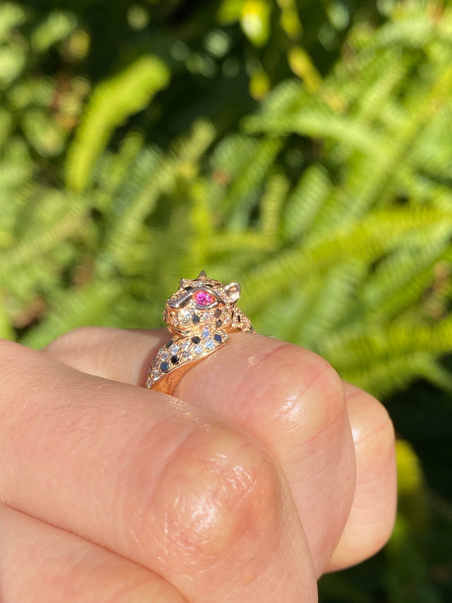 18K gold ruby and diamond leopard ring.
