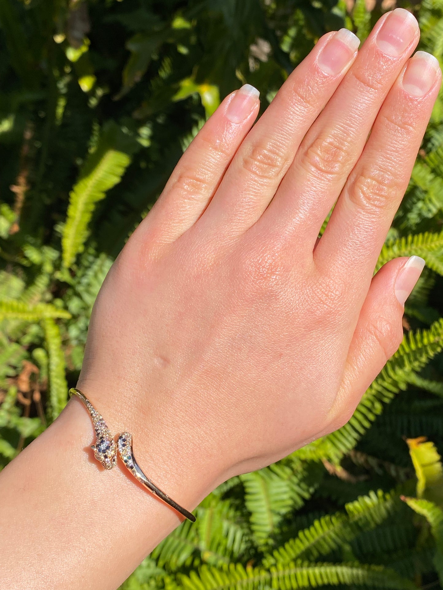 18K gold ruby and diamond leopard bangle.