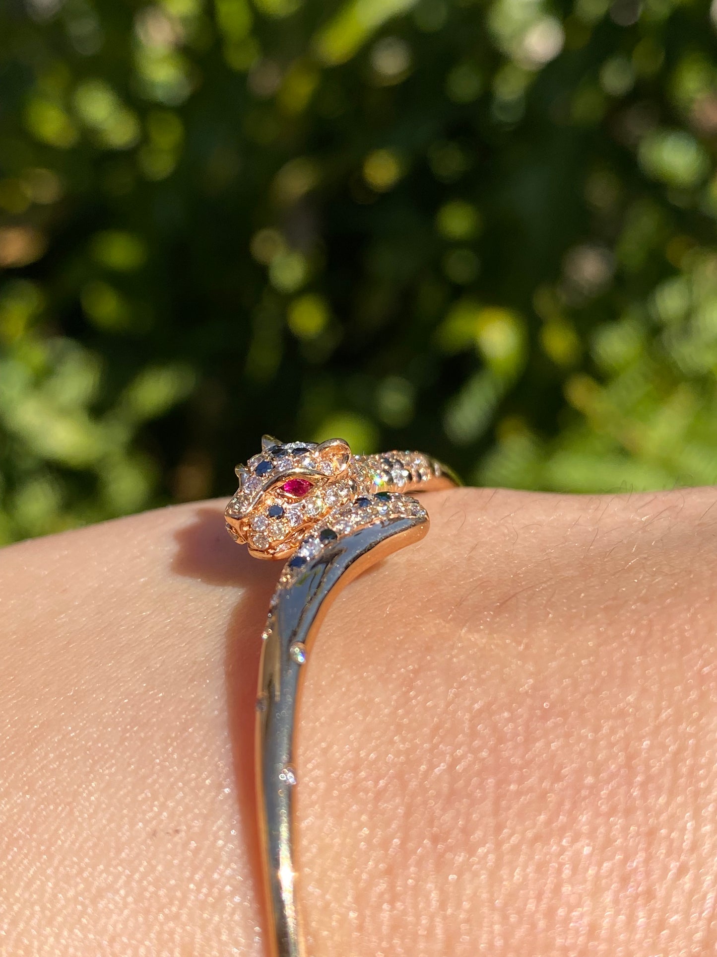 18K gold ruby and diamond leopard bangle.