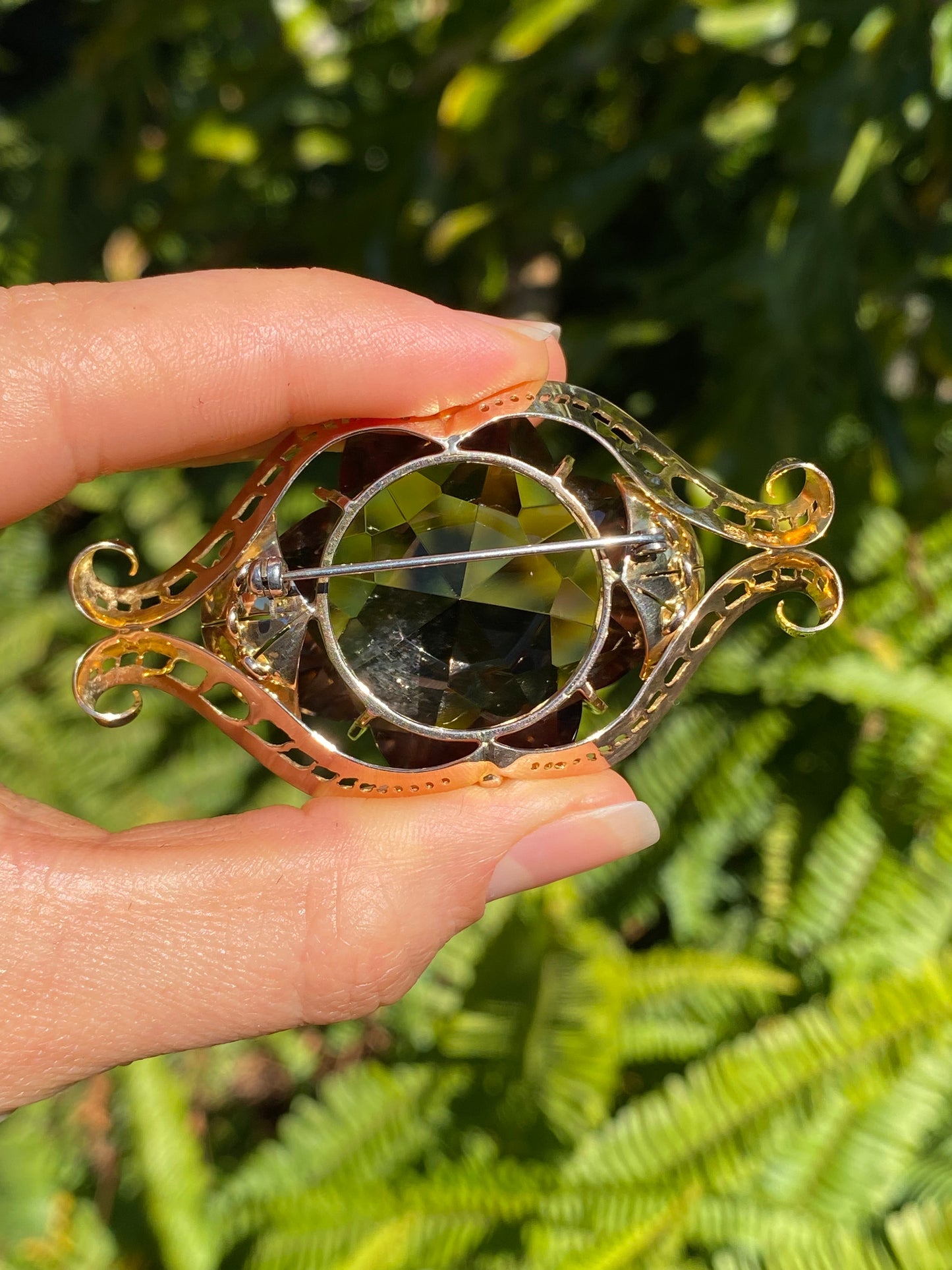Large 9K gold smoky quartz brooch, circa 1950.