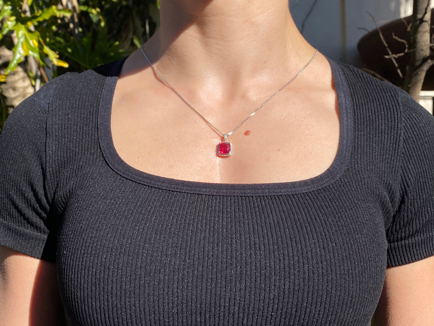 18K gold rubellite tourmaline and diamond pendant.