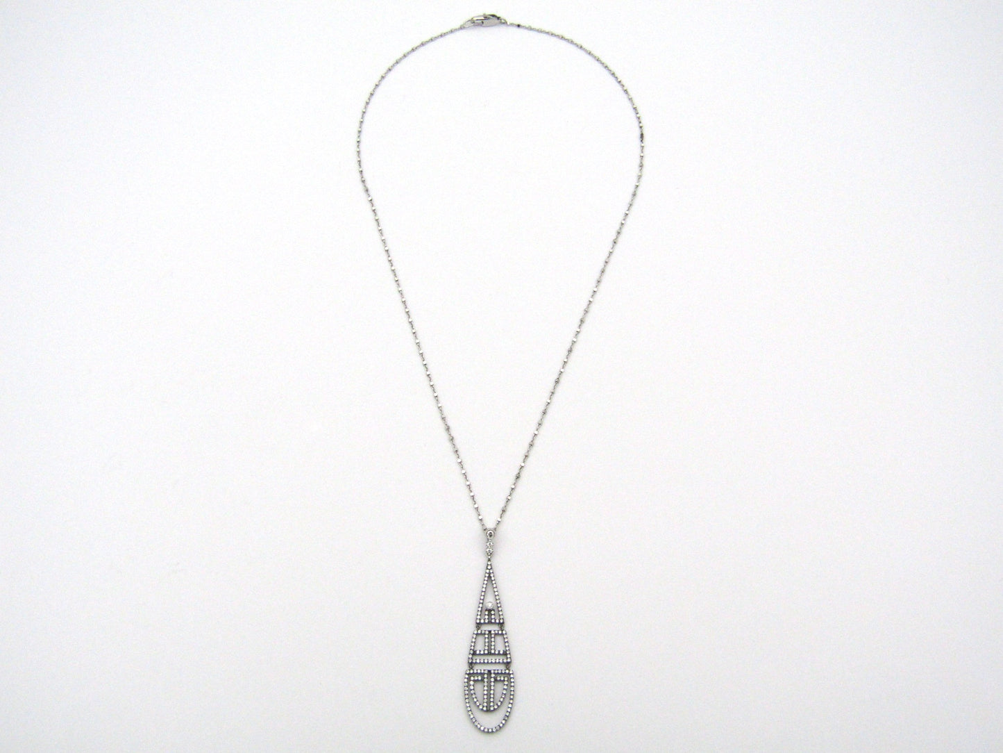 18K gold diamond Art Deco style geometric pendant.