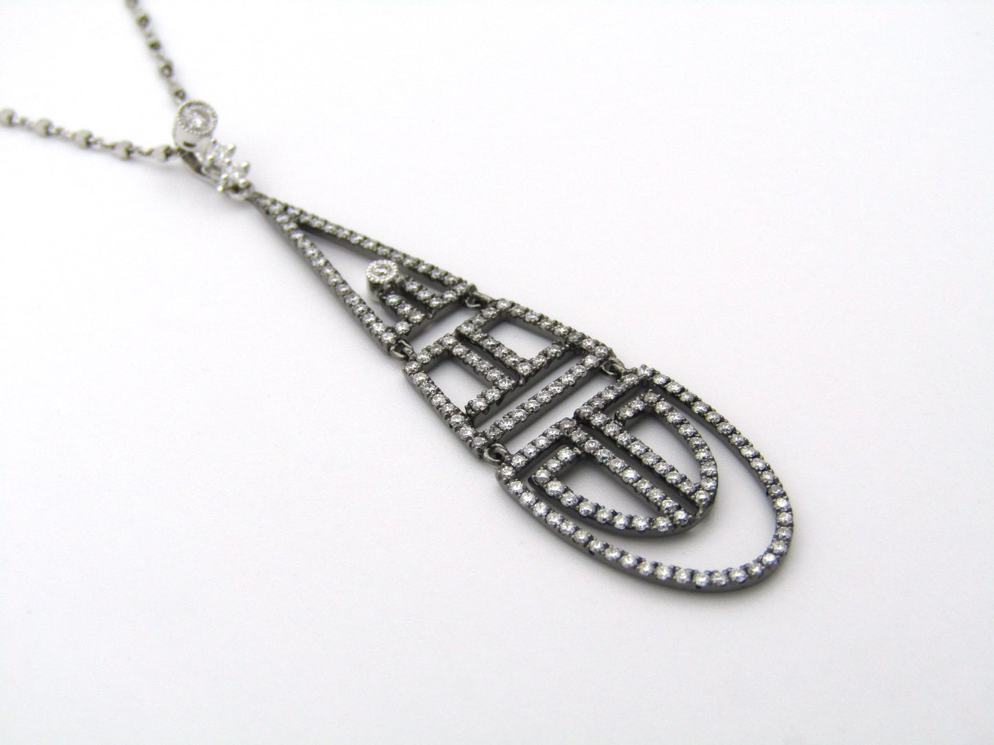 18K gold diamond Art Deco style geometric pendant.