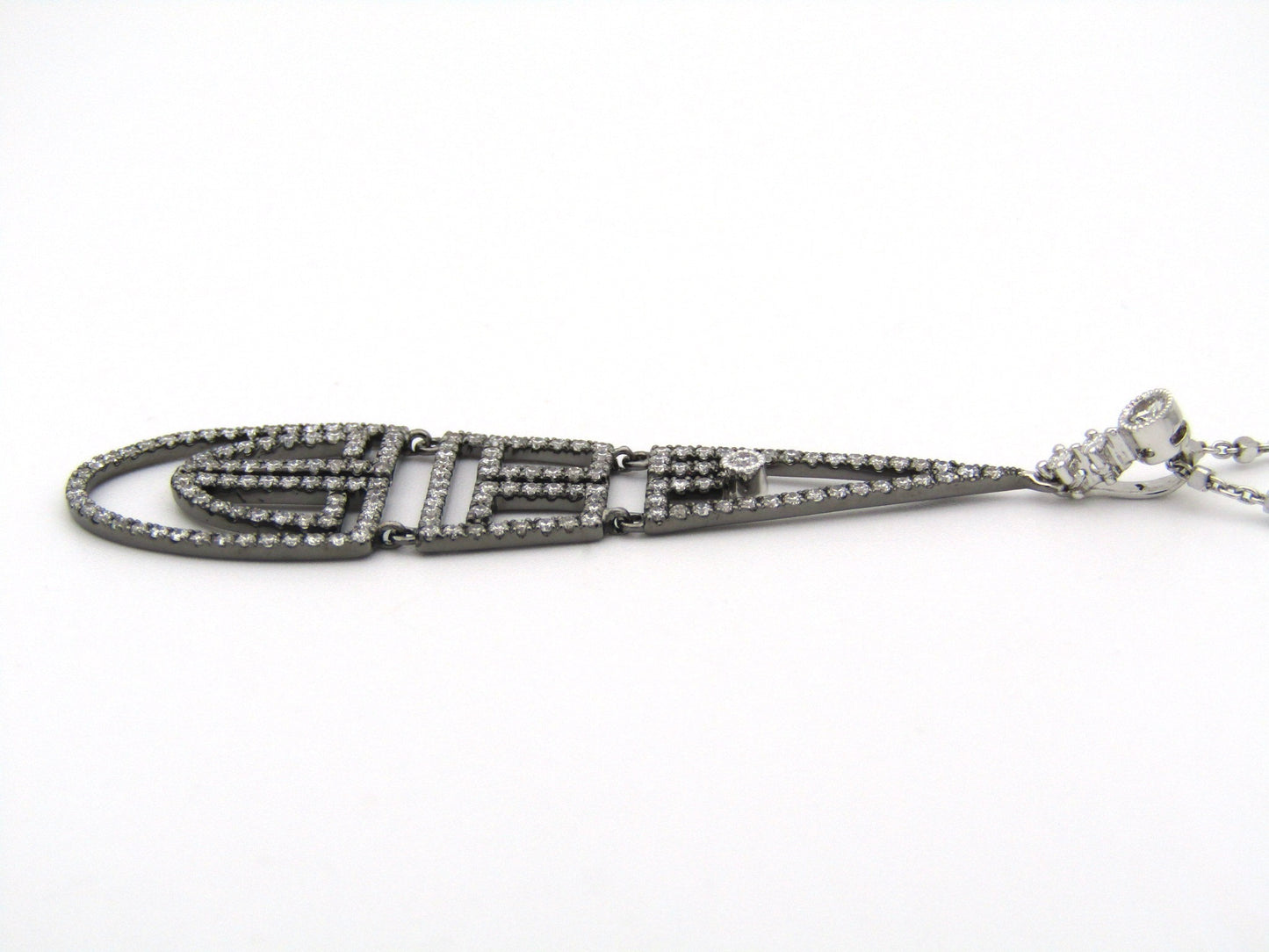 18K gold diamond Art Deco style geometric pendant.