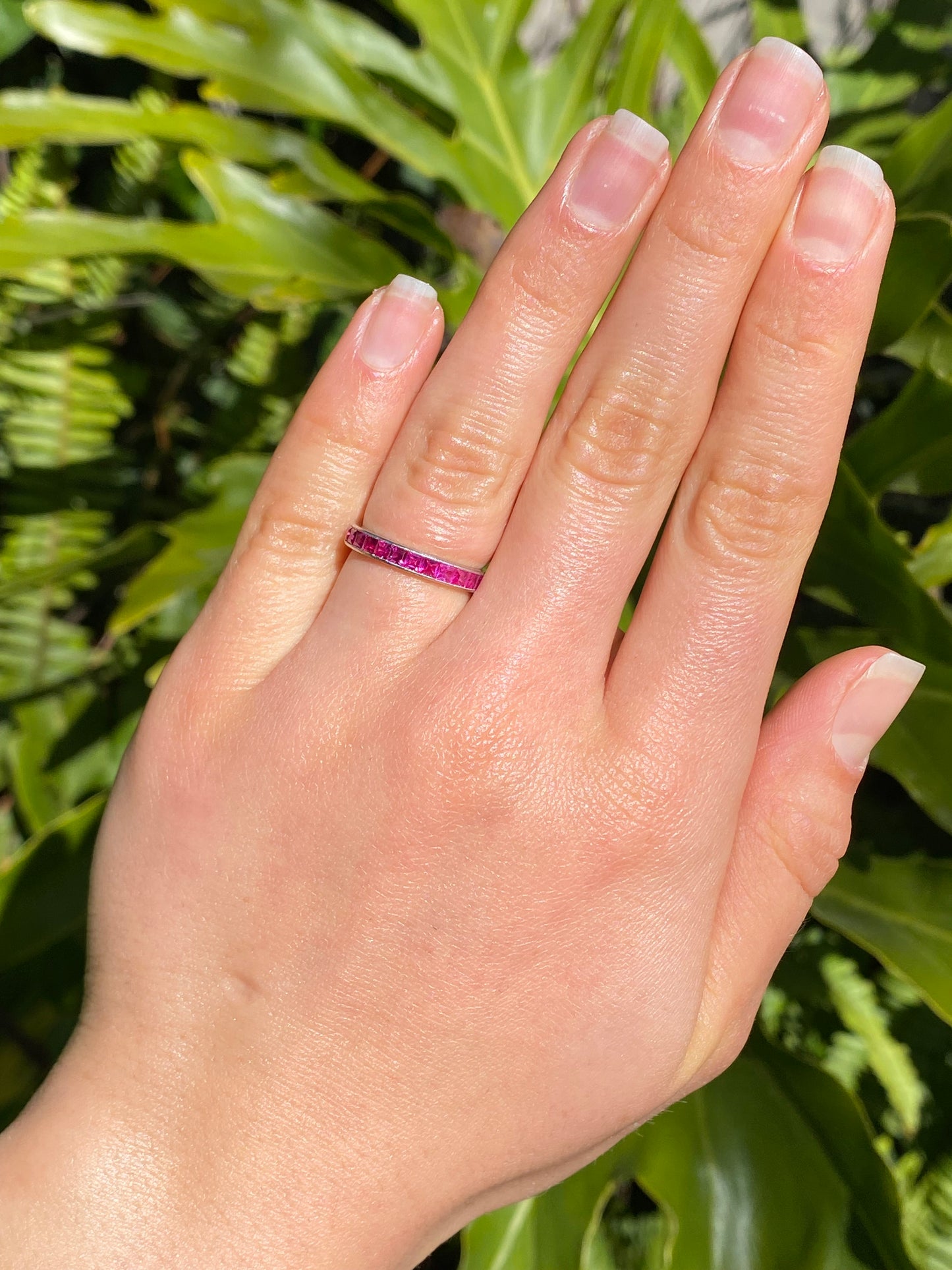 Platinum synthetic ruby eternity ring, circa 1990's.