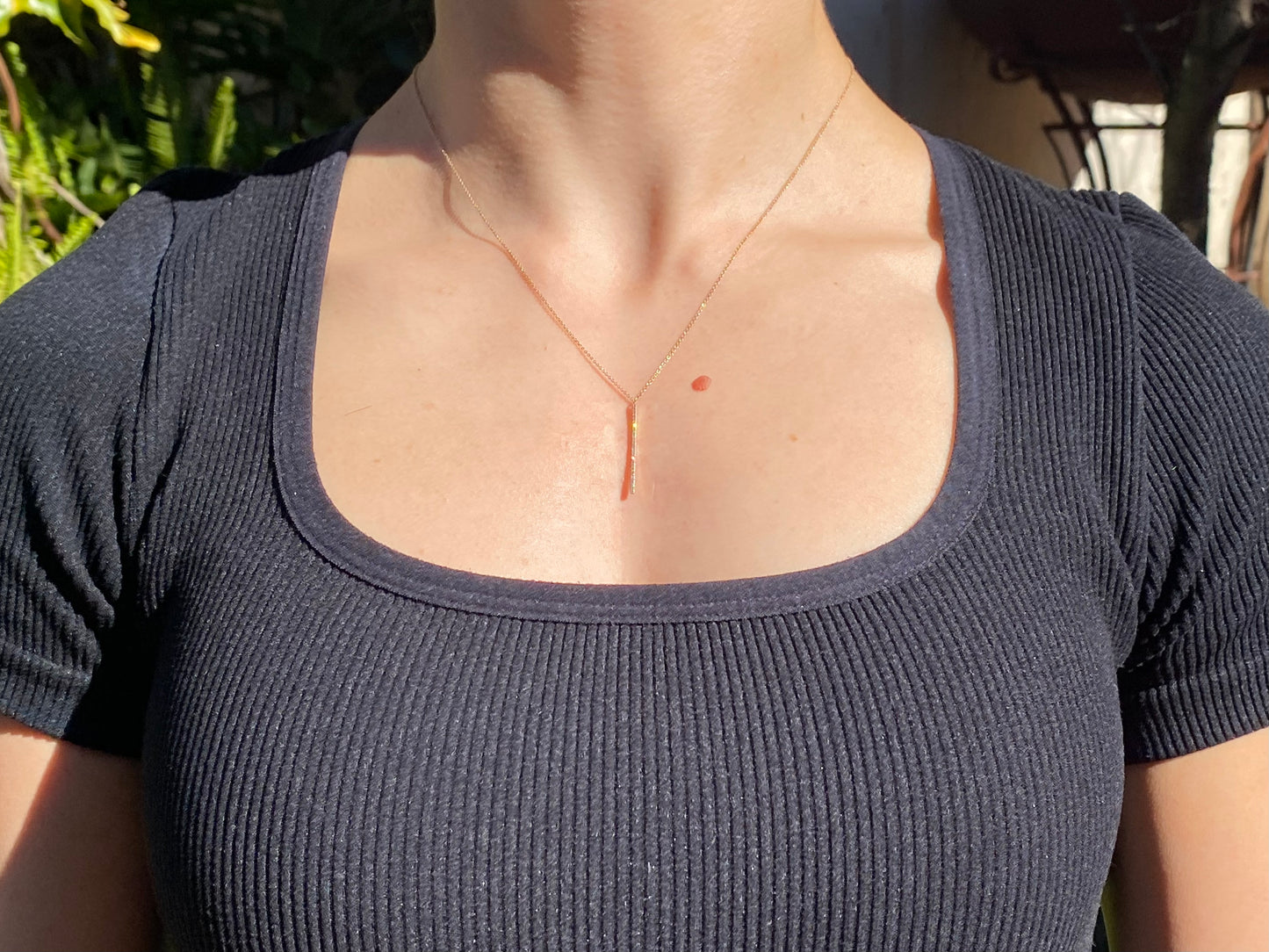 9K gold diamond bar necklace.