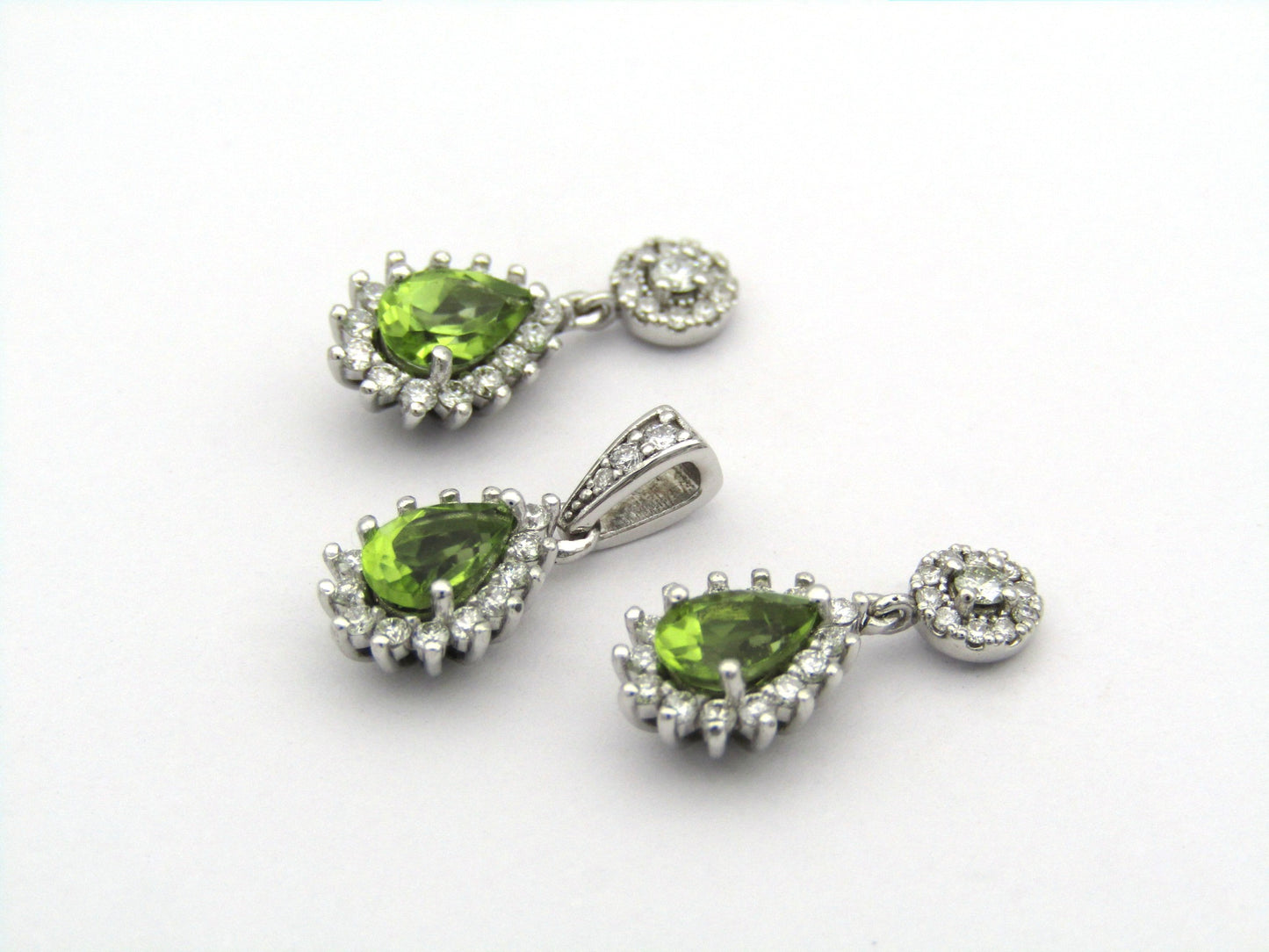 18K gold peridot and diamond earrings and pendant.
