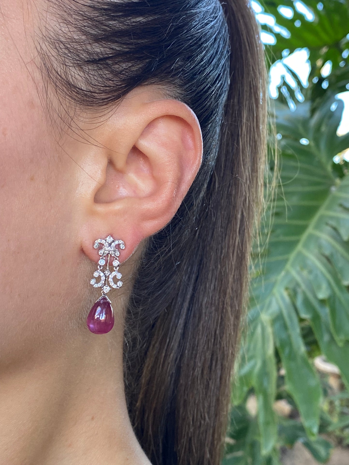 18K gold glass-filled ruby and diamond drop earrings.