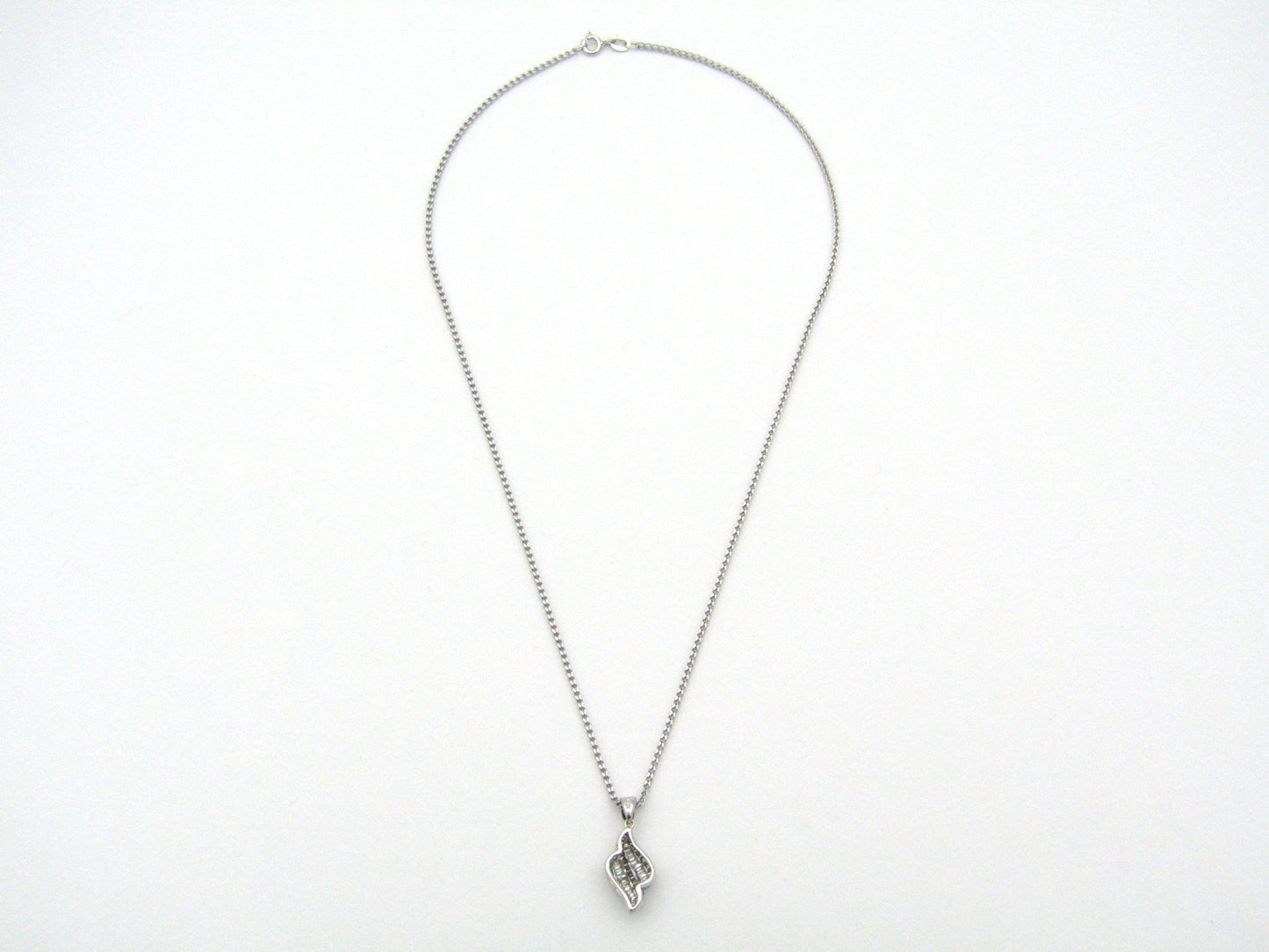 14K gold diamond pendant.