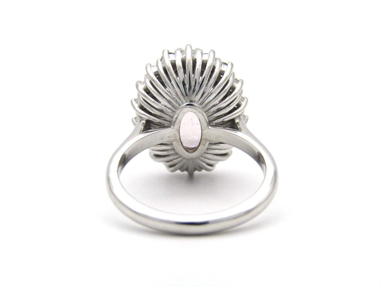 18K gold morganite and diamond halo ring.