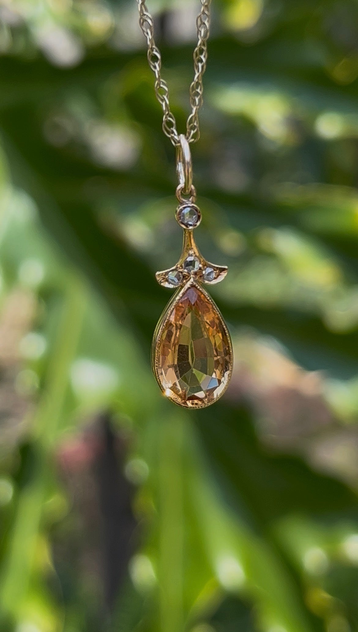 18K gold Edwardian topaz and diamond pendant, circa 1900.