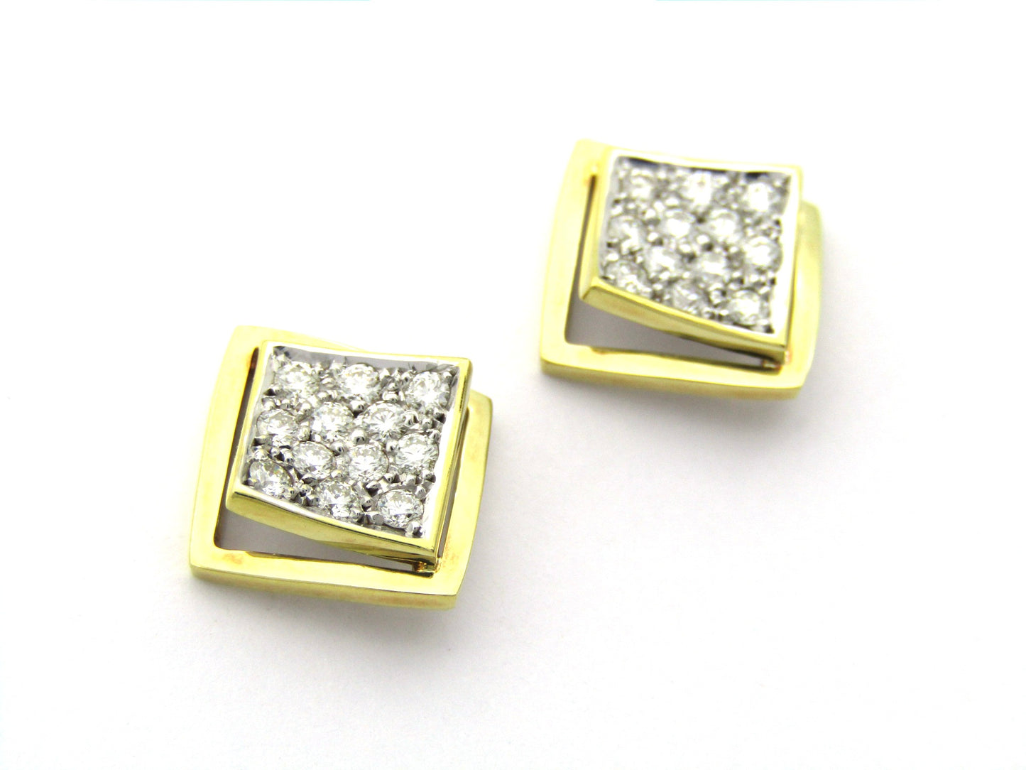 18K gold diamond earrings.