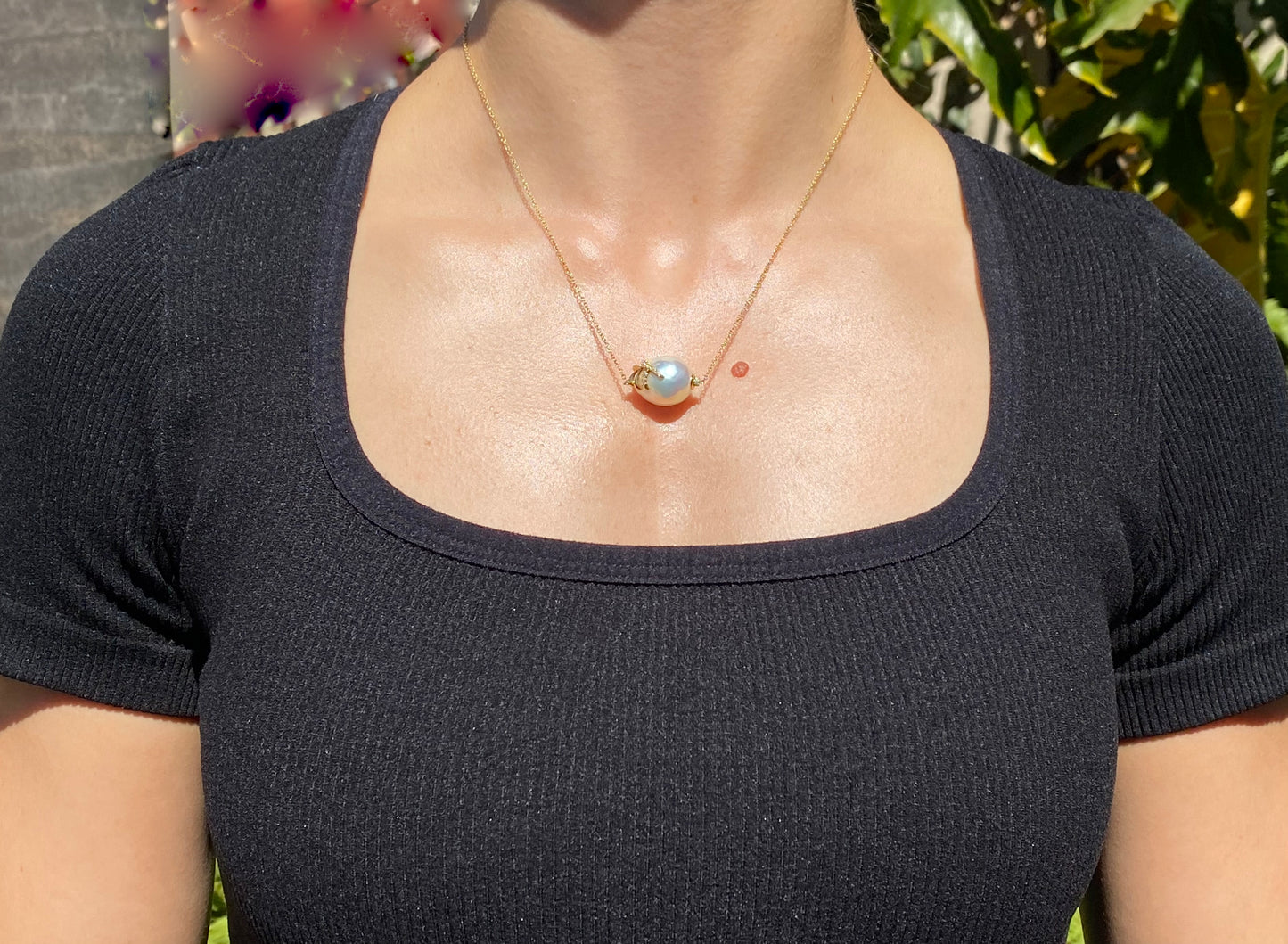 14K gold baroque pearl and diamond floating necklace.