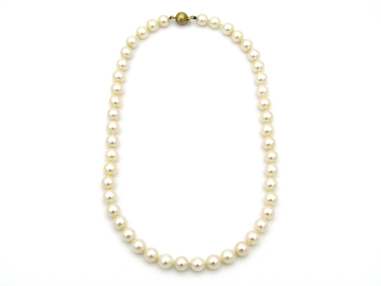 18K gold pearl and diamond necklace by Browns.