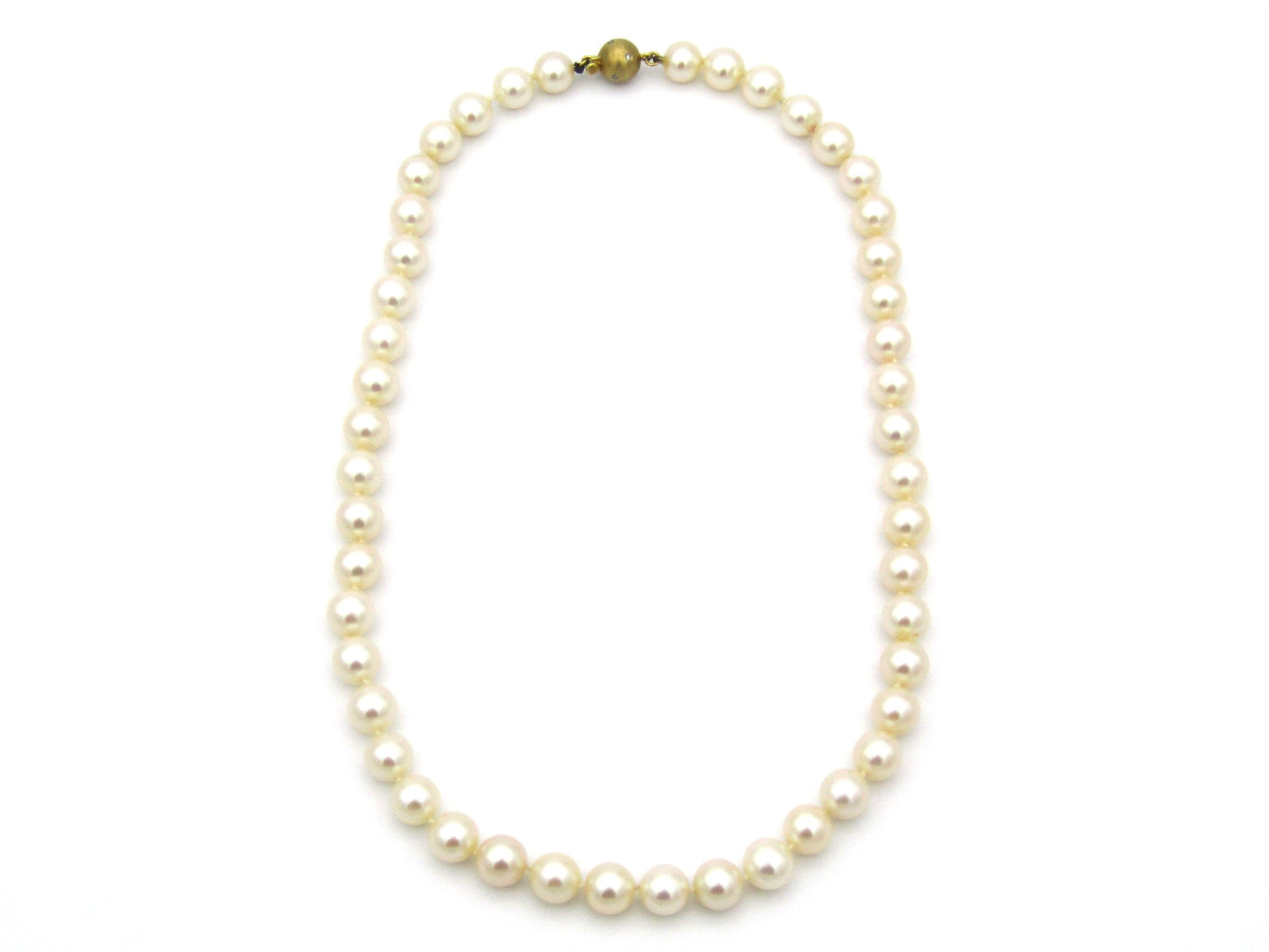 18K gold pearl and diamond necklace by Browns.