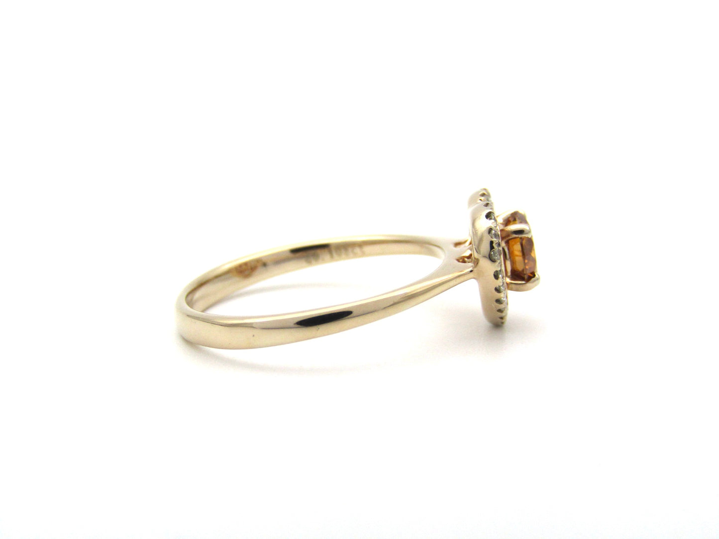 18K gold Orange diamond halo ring.