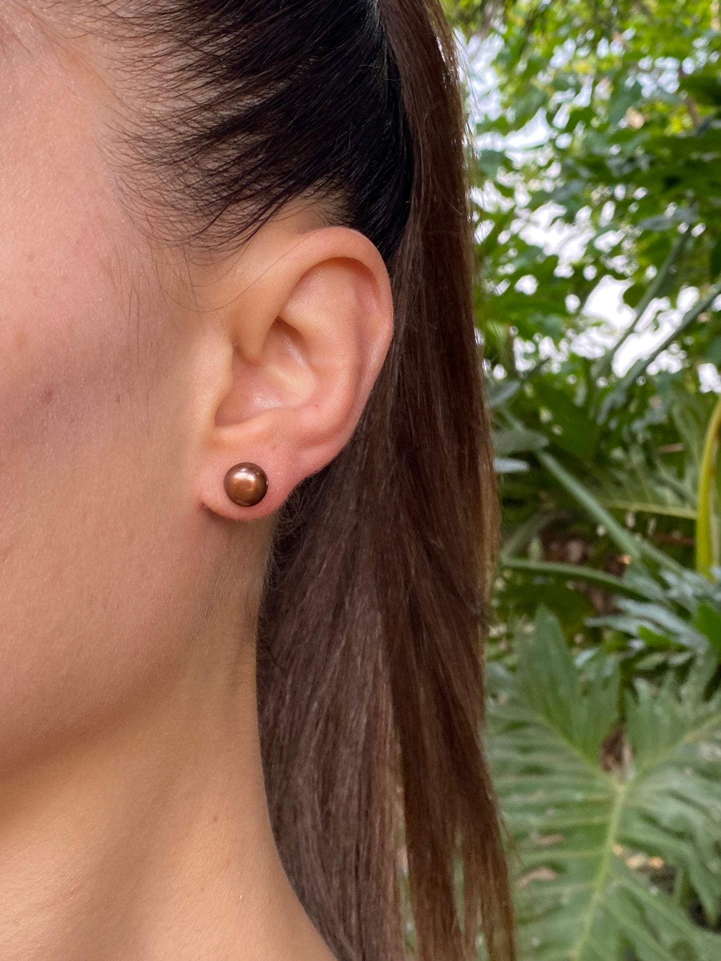 9K gold freshwater pearl stud earrings.