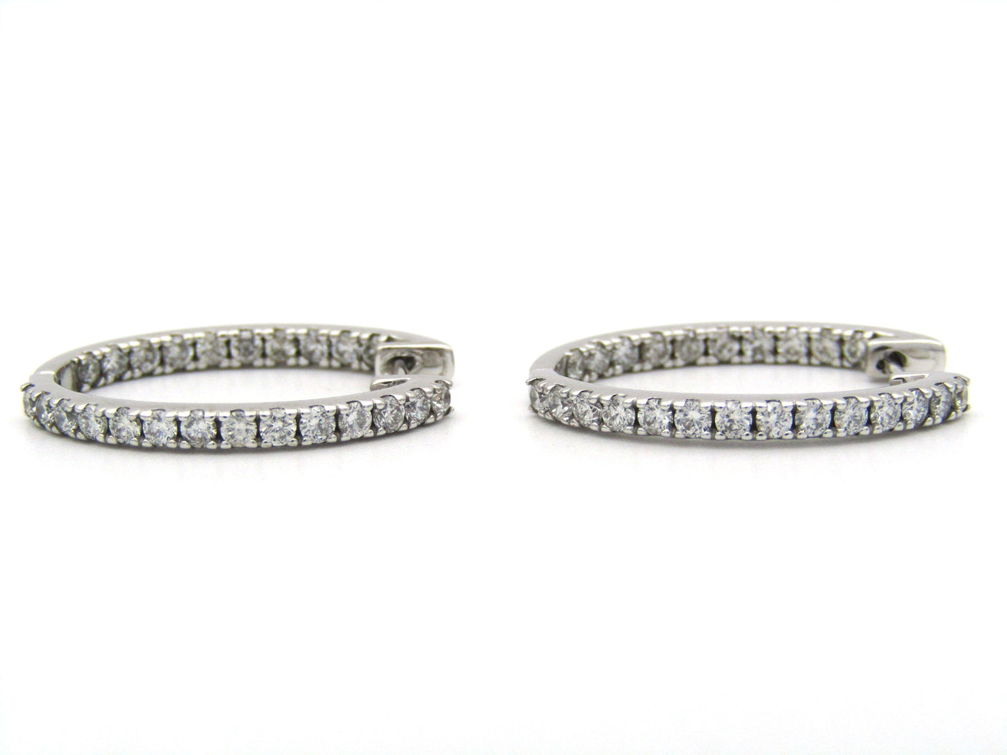 18K gold diamond hoop earrings by Browns.