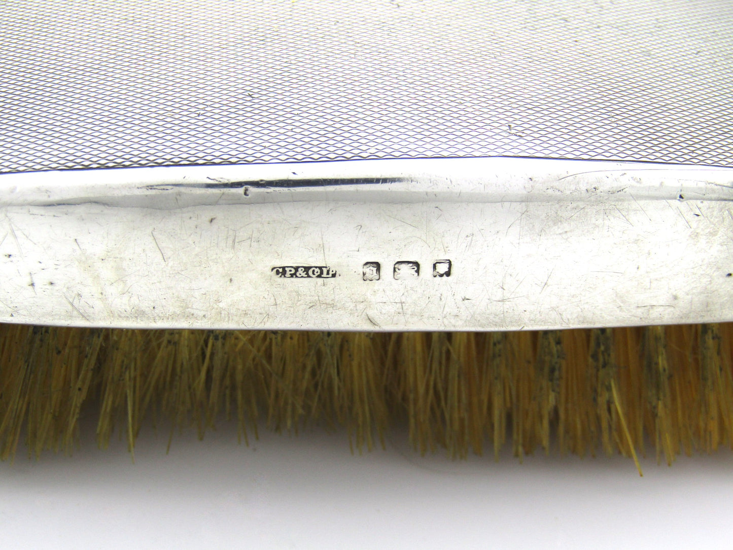 A pair of silver clothes brushes by Charles Packer & Co, London, 1929.