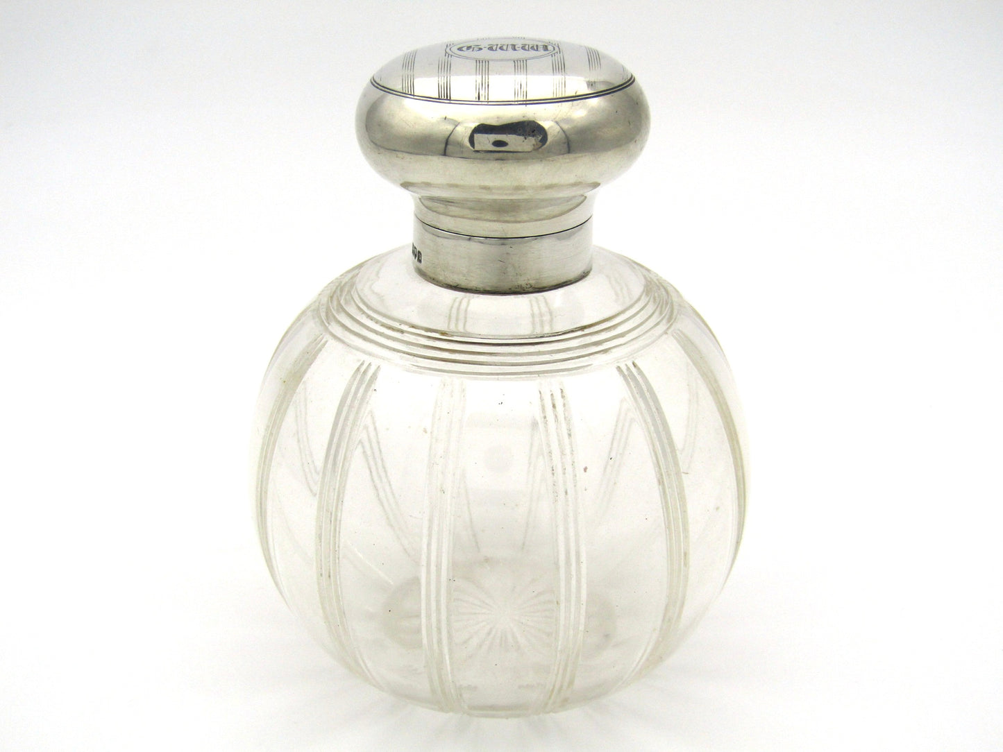 Silver-topped scent bottle by Mappin & Webb, London, 1915.