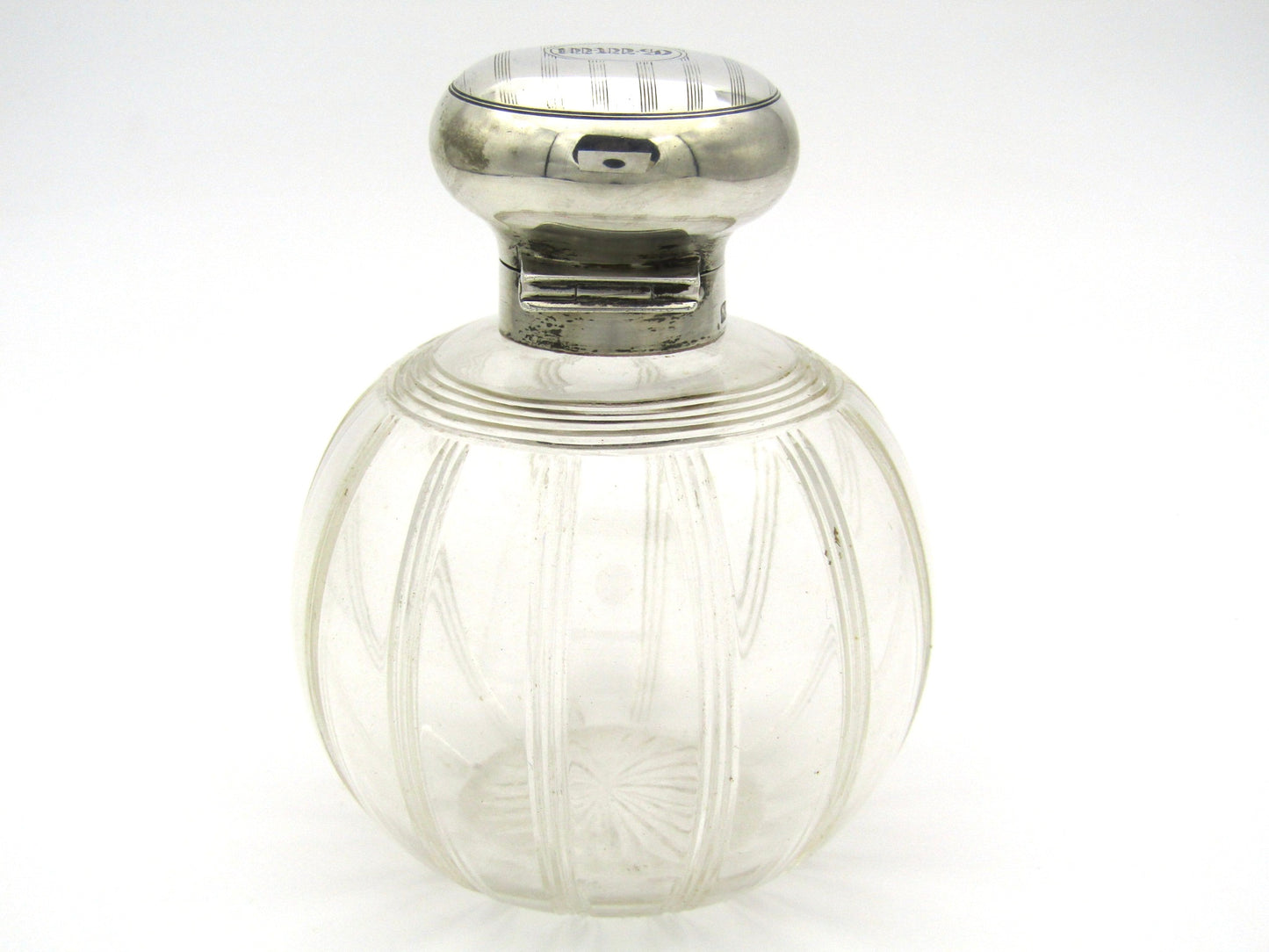 Silver-topped scent bottle by Mappin & Webb, London, 1915.