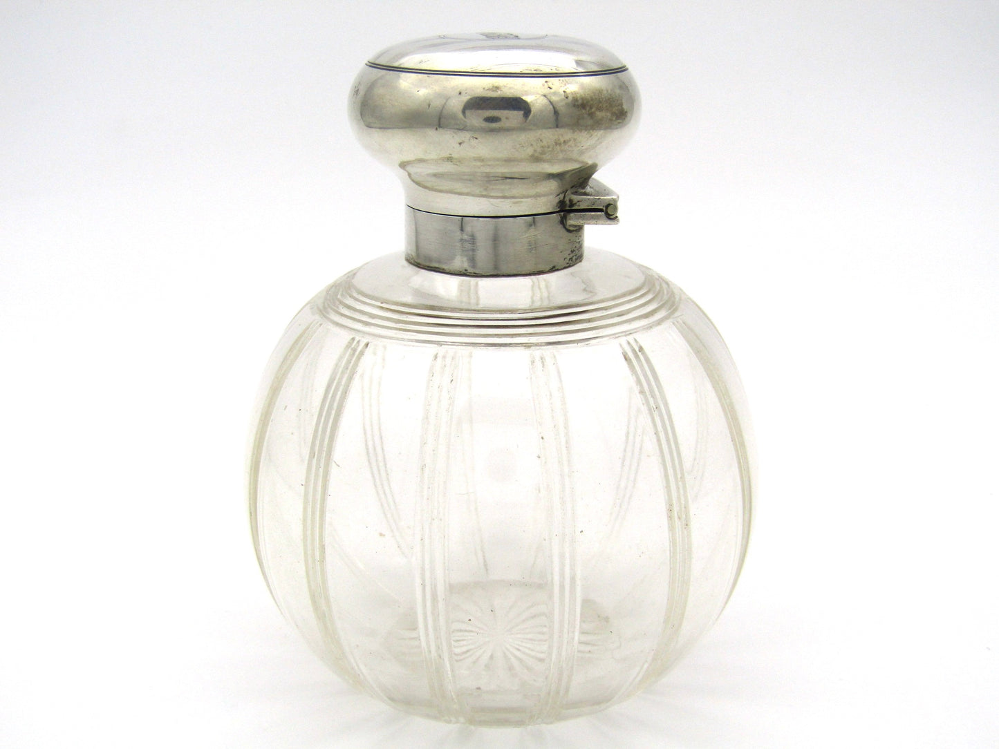 Silver-topped scent bottle by Mappin & Webb, London, 1915.