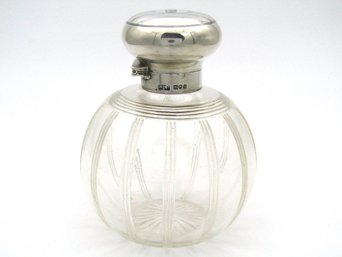 Silver-topped scent bottle by Mappin & Webb, London, 1915.