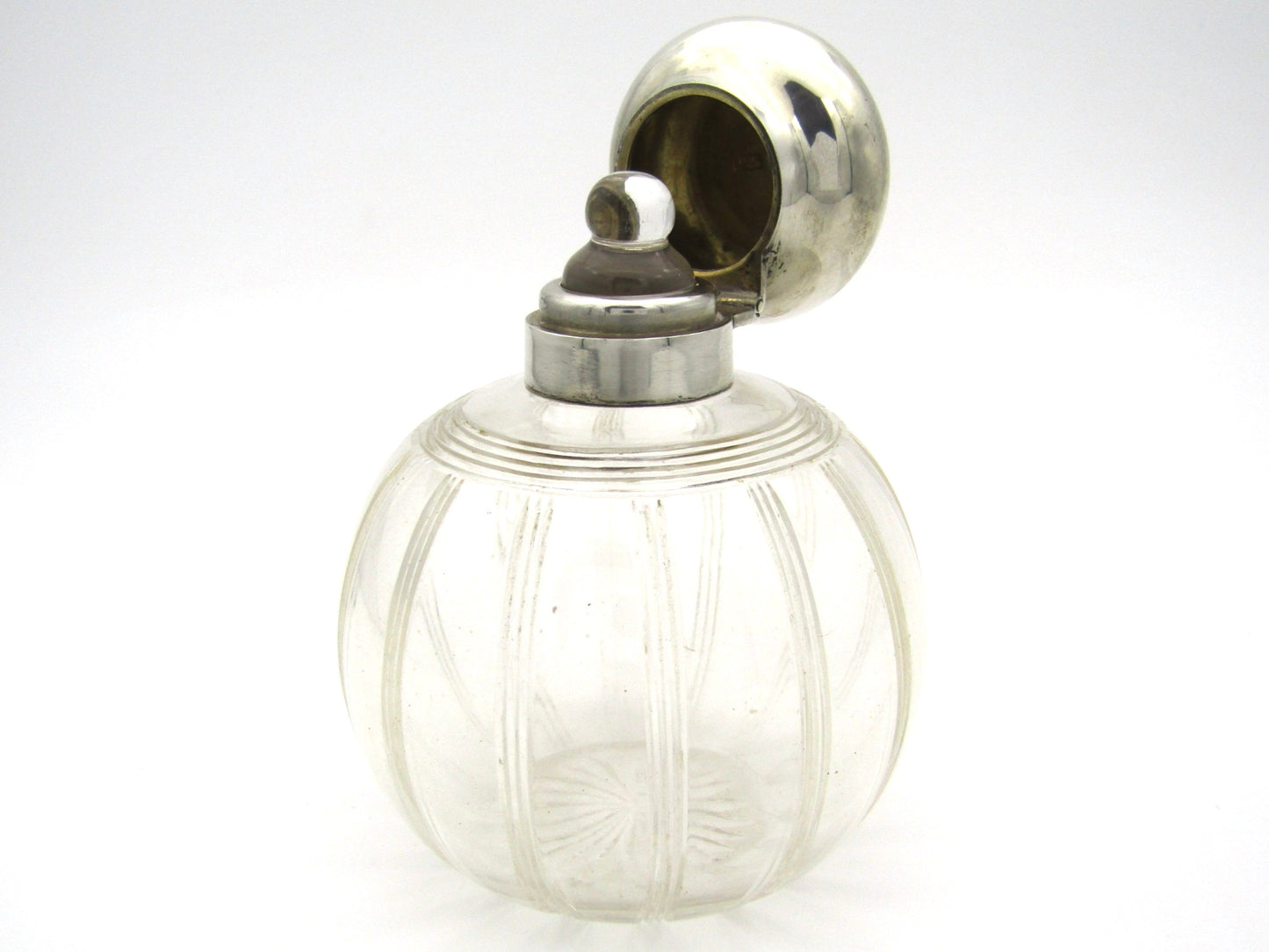 Silver-topped scent bottle by Mappin & Webb, London, 1915.