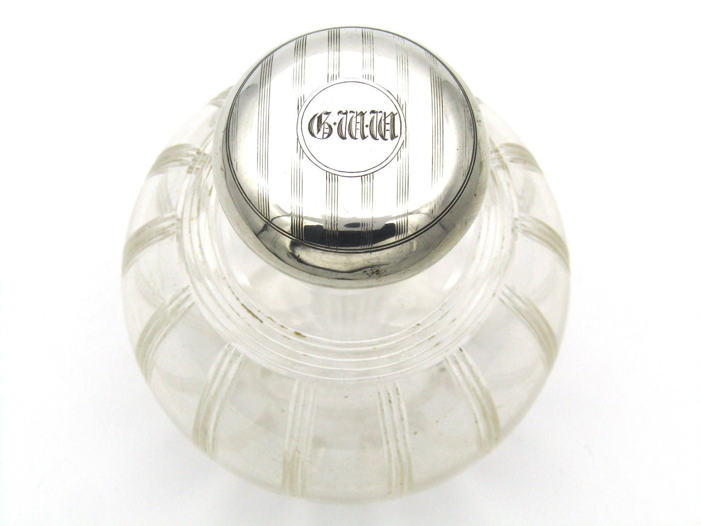 Silver-topped scent bottle by Mappin & Webb, London, 1915.