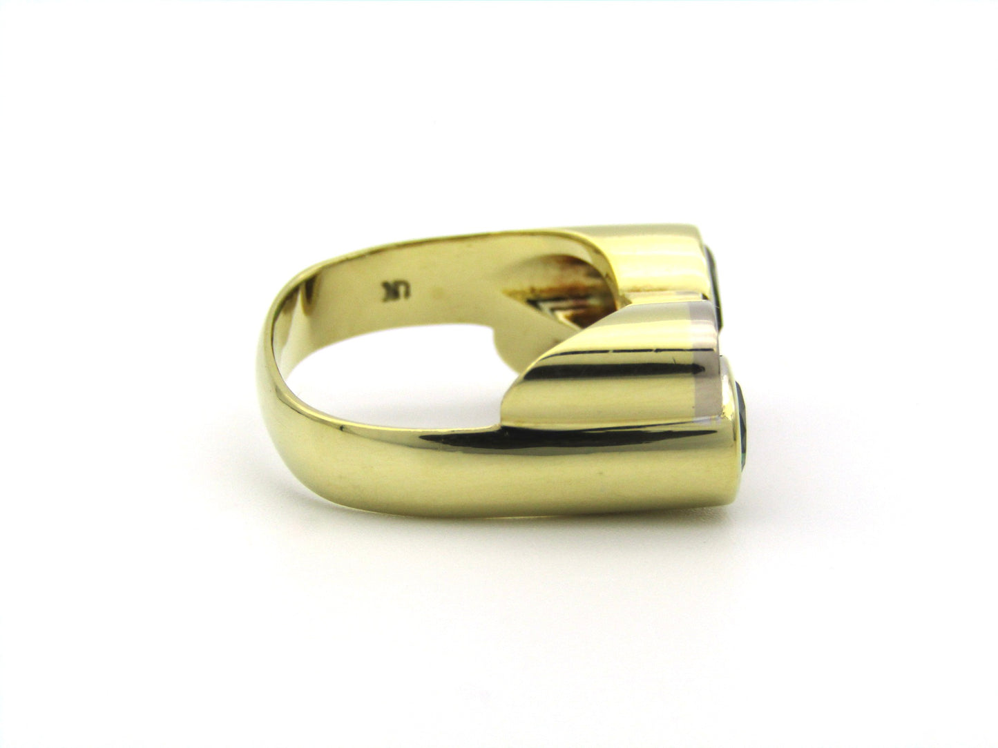 18K gold tourmaline and diamond ring by Uwe Koetter, circa 1990.