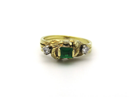 18K gold emerald and diamond ring, circa 1940's.