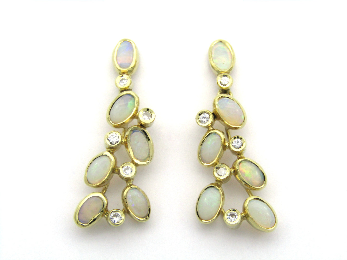 14K gold opal and diamond drop earrings.