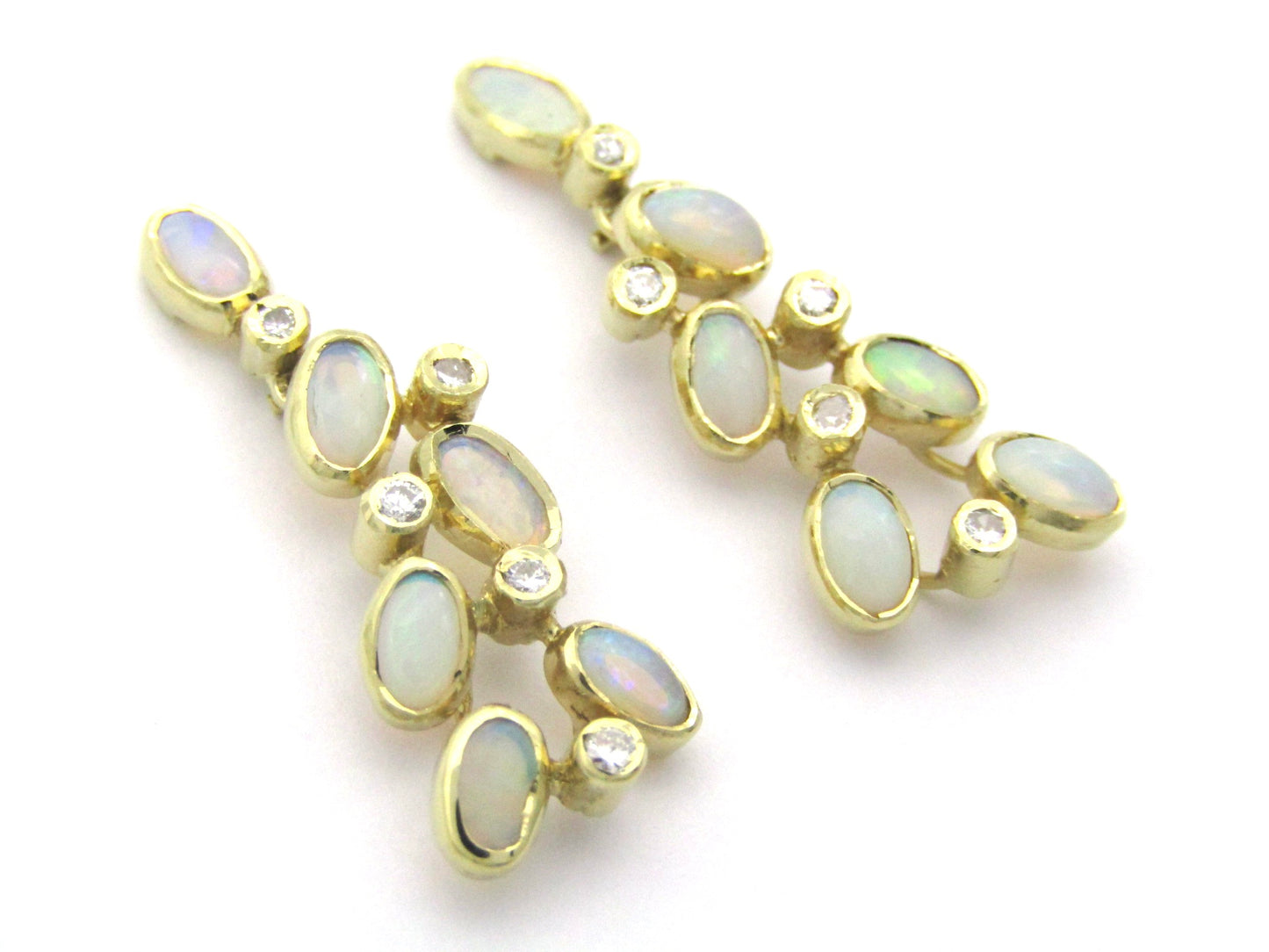 14K gold opal and diamond drop earrings.
