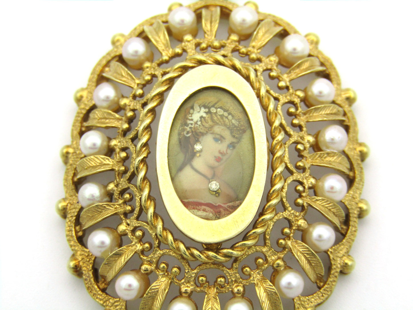 14K gold seed pearl hand painted miniature pendant, circa 1900.