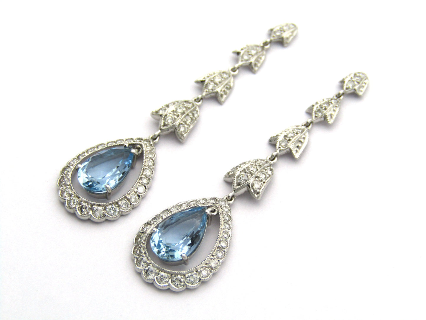 18K gold aquamarine and diamond drop earrings.