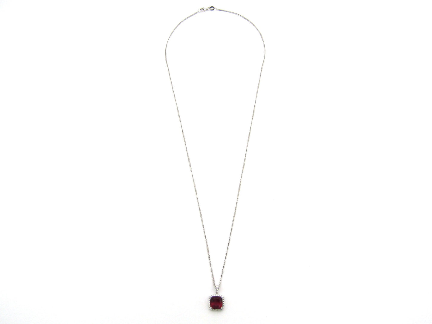 18K gold rubellite tourmaline and diamond pendant.