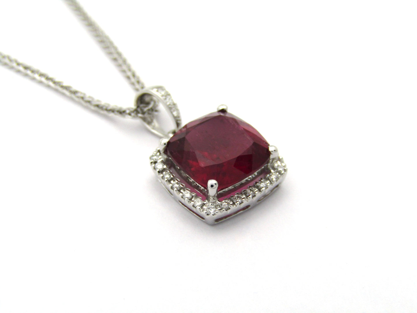 18K gold rubellite tourmaline and diamond pendant.