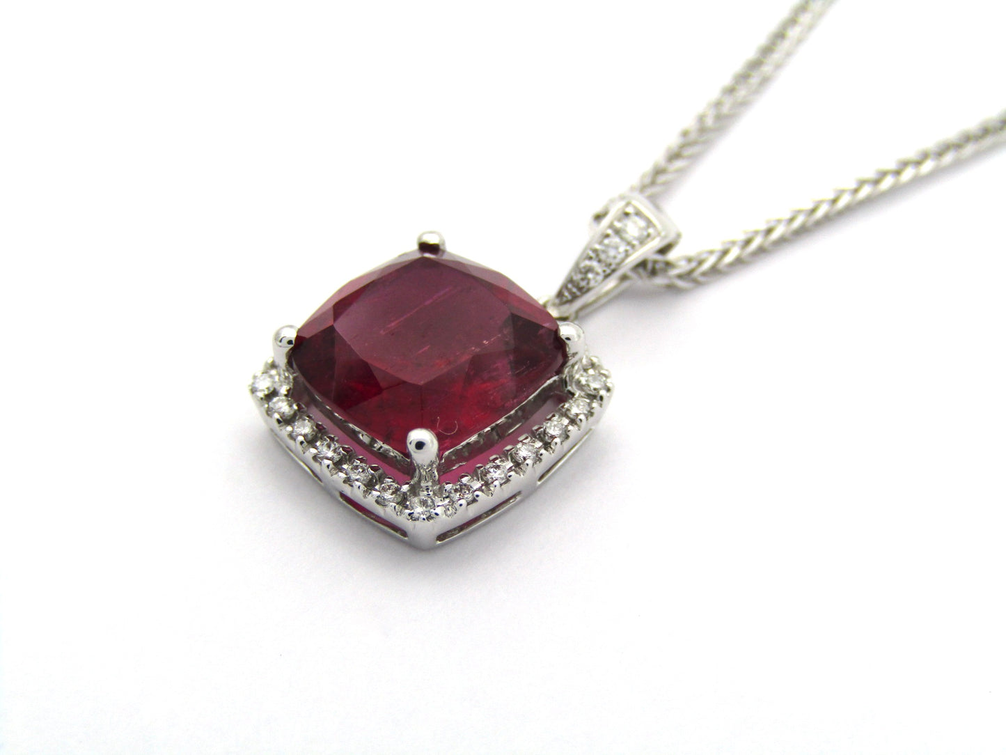 18K gold rubellite tourmaline and diamond pendant.