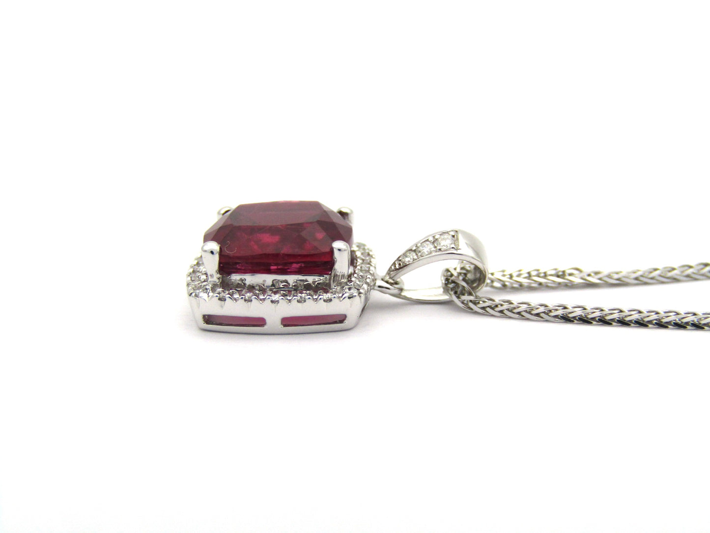 18K gold rubellite tourmaline and diamond pendant.