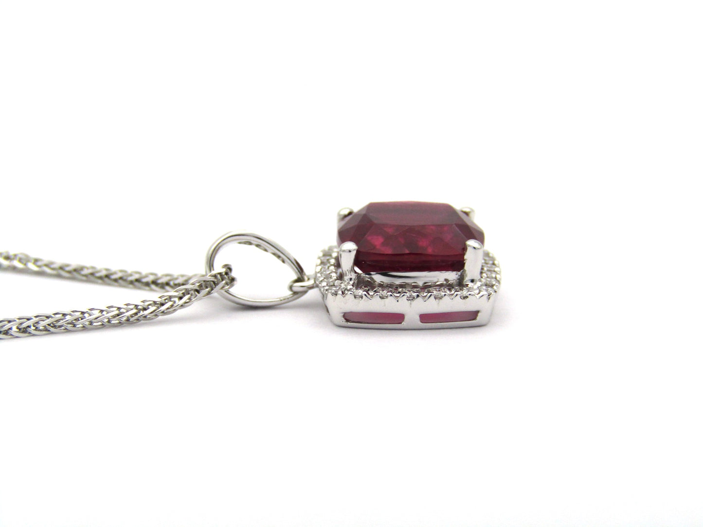 18K gold rubellite tourmaline and diamond pendant.