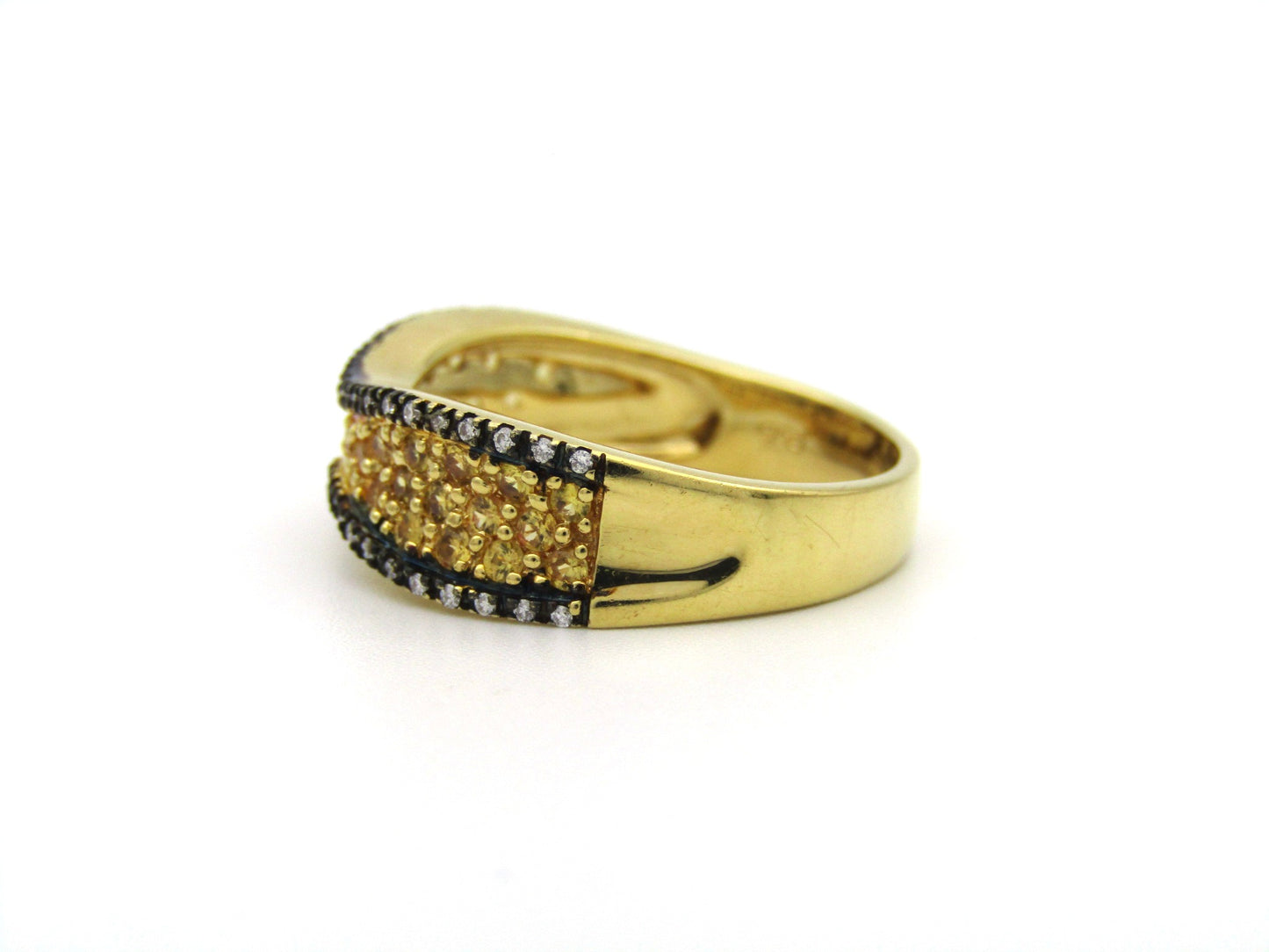 18K gold diamond band ring.