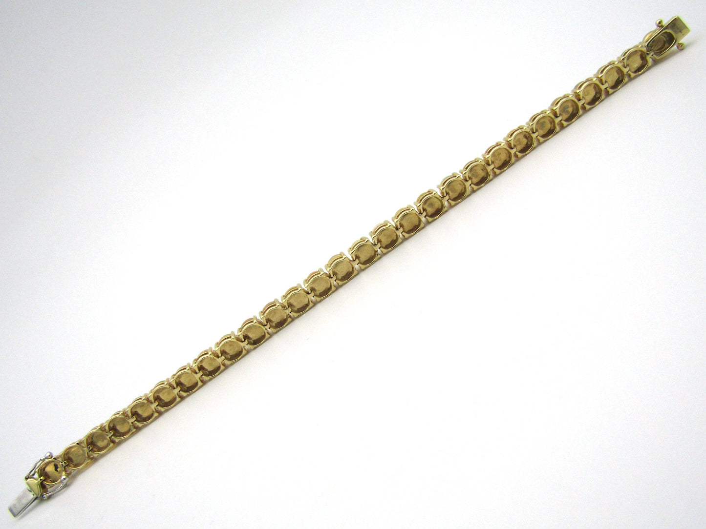 14K gold fire opal bracelet.
