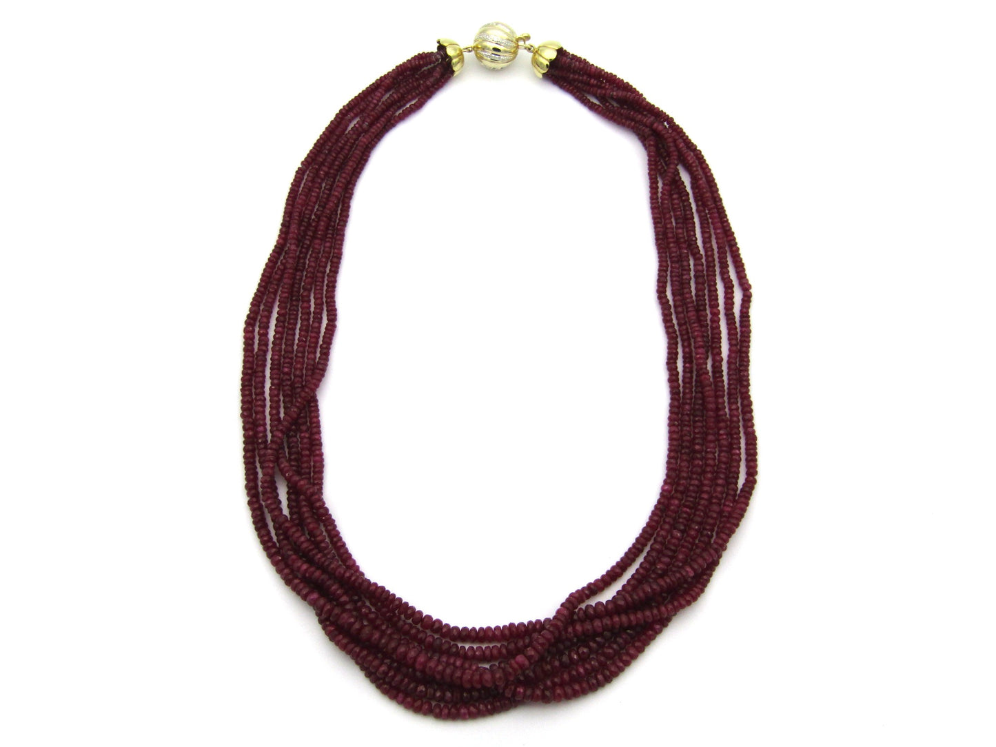 14K gold diamond and 7-strand ruby necklace.