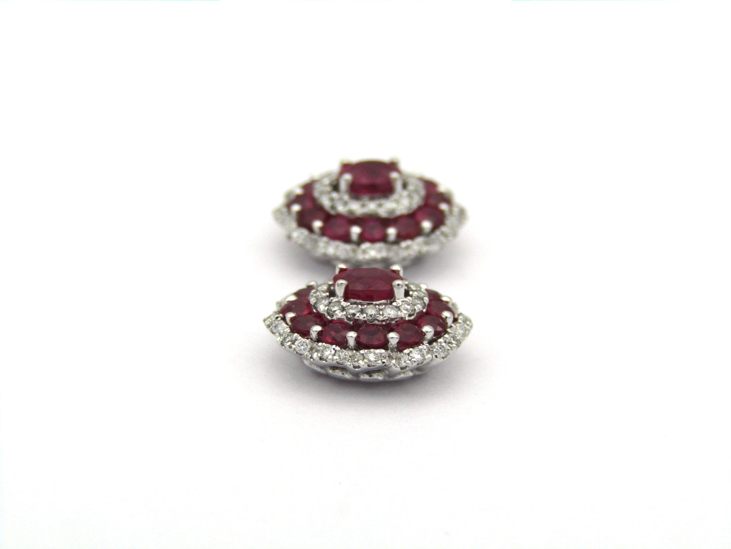 18K gold ruby and diamond earrings.